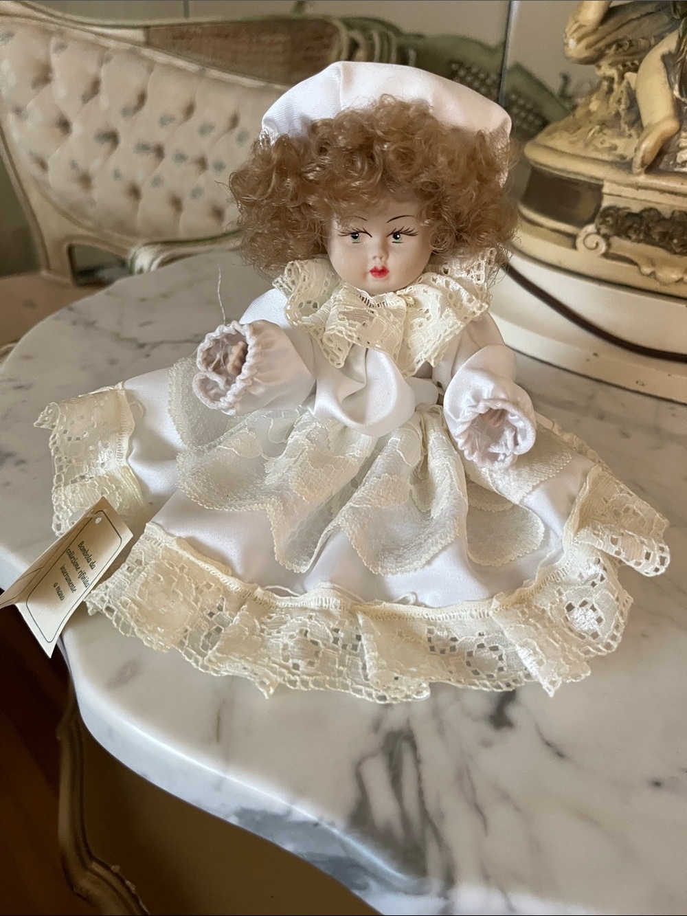 Calorimeter Porcelain-Style Collectible Doll in Ivory Dress -